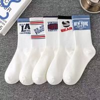 Chaussettes de sport haute performance en coton et nylon, tricotées, ODM, anti-humidité, anti-odeur, avec revers, blanches, pour l'automne