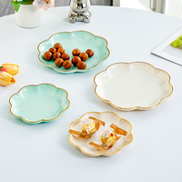2025 maison Table à manger haut de gamme Snack assiette moderne en plastique de qualité alimentaire léger luxe fruits et scories plat nouveau Os cracher Style