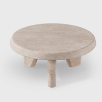 Table basse moderne en marbre travertin, design trépied en pierre naturelle, surface polie pour salon