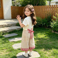 Conjunto de Ropa Infantil de Dos Piezas con Lazo, Estilo Coreano 2026, para Niña, Manga Corta - Atuendo de Verano Elegante y Moderno