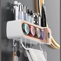 Porte-brosse à dents de salle de bain OEM perforation libre rince-bouche ventouse brossage mural avec distributeur de dentifrice