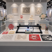 Machine de découpe laser CNC pour l'art papier complexe et les fleurs en papier, graveur laser de bureau pour les entreprises de création en papier