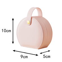 Boîte à bijoux en cuir PU personnalisée en gros avec logo, étui de voyage portable rond à double couche avec poignée
