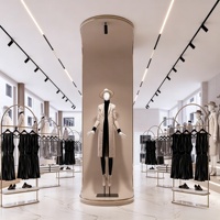 Portant à vêtements rotatif et pliable sur pied en métal personnalisé, facile à assembler, pour la rénovation de magasins de vêtements