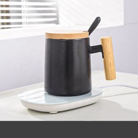 Tasse en céramique thermostatique à 55 degrés directement de l'usine tasse à café en porcelaine tasse chauffante automatique USB avec manche en bois