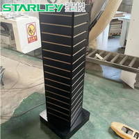 Présentoir rotatif Starley Direct Factory en MDF noir, léger, écologique et personnalisé, pour bijoux et produits sur panneau rainuré