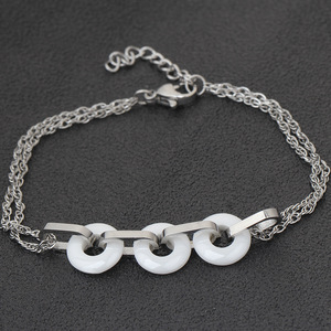 Pulsera de acero inoxidable con tres círculos de cerámica en blanco y negro, joyería de moda unisex - Product Image 3