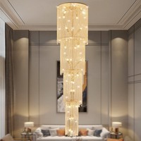 Lustre moderne de grande taille en or BGST Lighting, grand luminaire suspendu long et luxueux, cristal K9, pour escaliers et hôtels.