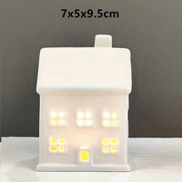 Maison de Noël en céramique mignonne, figurine décorative, bougie électronique LED, veilleuse en porcelaine, maison de Noël blanche en céramique