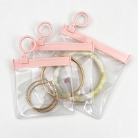 Pochette à bijoux transparente avec fermeture éclair coulissante et crochet en plastique, sac de rangement anti-ternissement pour boucles d'oreilles, colliers et accessoires