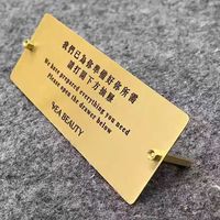 Plaque tactile en laiton brossé doré personnalisée conforme ADA avec impression UV pour hôtel, toilettes, bureau, immeuble
