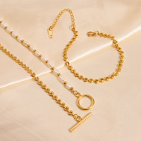 Collier de perles ERESI Collier de chaîne cubaine à boucle OT en acier inoxydable Demi-chaîne cubaine Collier connecté de demi-perles d'eau douce
