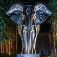 Statue de tête d'éléphant personnalisée en acier inoxydable avec relief en métal poli avec un style Feng Shui pour installation artistique