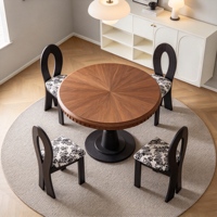 Ensemble de table à manger ronde de style mid-century, table à manger vintage française sur piétement avec chaise à dossier creux et tissu floral capitonné