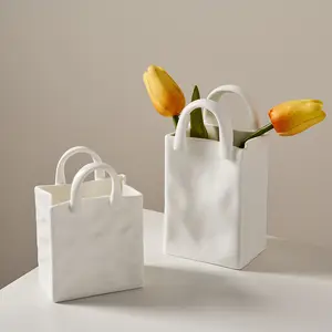 नॉर्डिक खरीदारी की टोकरी सिरेमिक मिनी फूलदान सजावट सरल सूखे फूल व्यवस्था फूलदान मेज कमरे में रहने वाले सजावट उपहार