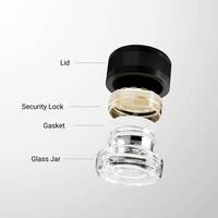 Pot en verre personnalisé avec logo pour concentré de rosin 2g, emballage scellé à l'étanchéité pour produits à base de cire, avec sécurité enfant