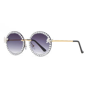 Gafas de sol redondas elegantes con diamantes de imitación para mujer, montura metálica, protección UV400, estilo de diseñador a la moda, gafas de sol ligeras de lujo - Product Image 1