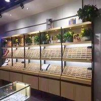 Meubles de magasin d'optique modernes et élégants de haute qualité, comptoir d'exposition de lunettes pour la conception de vitrines, présentoirs