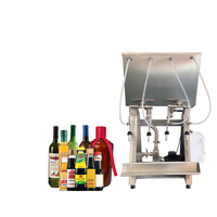 Machine de remplissage semi-automatique à 6 têtes pour le remplissage et le bouchage de bouteilles de vin à petite échelle