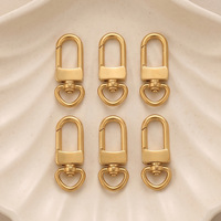 Vente en gros de fermoirs en acier inoxydable plaqués or 18 carats en forme de cœur, d'étoile et de fleur pour la fabrication de bijoux