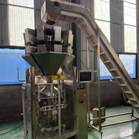 Machine d'emballage et de remplissage automatique à grande vitesse contrôlée par PLC pour les granulés de sucre, les grains de café, les liquides en bouteilles