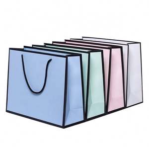 Sacs en papier de luxe personnalisés avec cordon de serrage, recyclables, prix d'usine KM Chine, avec logo pour vêtements - Product Image 1