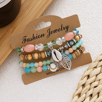 Bracelet Bohème Superposé Perles de Riz Colorées Coquillages Feuilles Bracelet de Luxe en Cristal et Pierres Géométriques pour Femme Cadeau