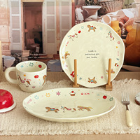 Assiette elliptique en céramique, assiette de Nouvel An, cadeau créatif pour la maison, assiette de haute qualité et au design élégant
