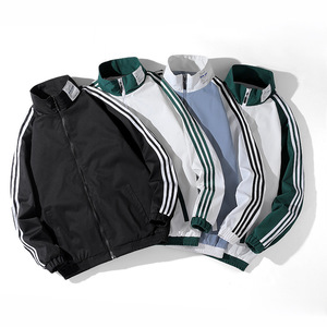 Ropa de hombre de alta calidad, chaquetas de talla grande con cuello levantado, uniforme de béisbol de manga larga a rayas, chaqueta cortavientos de retazos - Product Image 1