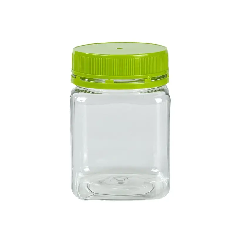 Pot de miel en plastique PET carré de qualité alimentaire sans BPA 200ml 250g de miel de Manuka avec bouchon inviolable