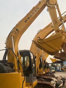 Excavatrice compacte sur chenilles Komatsu PC128US d'occasion, fonctionnement fluide pour les chantiers en espace restreint - Product Image 2