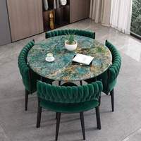 Meubles de salle à manger modernes, table ronde avec structure en fer et chaises, plateau en marbre, pour petit appartement