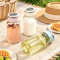 Bouteille d'eau sport en verre transparent écologique personnalisée, prix de gros, avec couvercle à vis et poignée, pour usage extérieur