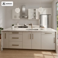 Meuble de cuisine de luxe en acrylique avec îlot et rangement coulissant pour maison, avec plan de travail en quartz et structure en contreplaqué
