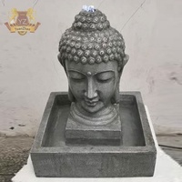 Grande fontaine d'eau en marbre personnalisée avec tête de bouddha Statue de bouddha de jardin en pierre noire naturelle