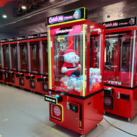 Machine à griffes transparente rouge Nexo Lighting, machine à griffes à peluche à fort rendement, construction métallique durable pour une activité commerciale à long terme