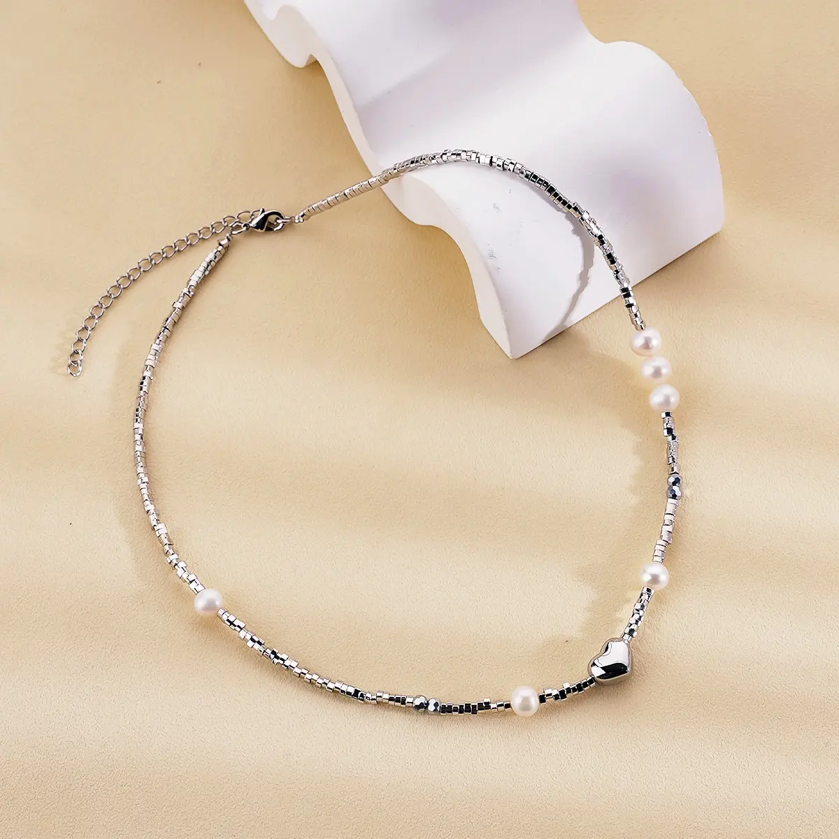 Grosir liontin jimat Hati baja tahan karat kalung perhiasan Fashion wanita mutiara imitasi batu Hematite