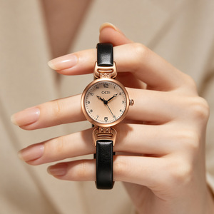 Reloj de cuarzo redondo de oro rosa para mujer GEDI, correa de cuero genuino marrón con pequeños conectores decorativos de cristal, estilo vintage color champán. - Product Image 4
