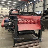 Séparateur de pierres et de boues de type roue pour bauxite, galets et argile kaolinique