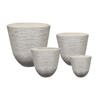 Ensemble de pots de fleurs ronds en plastique blanc pour l'extérieur