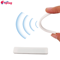 Étiquette de blanchisserie en silicone RFID OEM 860 ~ 960mhz avec longue plage de lecture pour les opérations de blanchisserie à grande échelle
