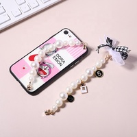 Chaîne de téléphone personnalisée avec perles et nœud papillon bts