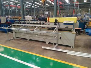 เครื่องขึ้นรูปเหล็กแผ่นรูปตัว T สำหรับฝ้าเพดาน แบบ OEM ODM ปรับแต่งได้ พร้อมมอเตอร์ PLC รองรับน้ำหนัก 5000 กก. กำลังไฟ 5500 วัตต์ - Product Image 4