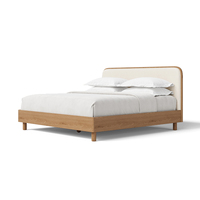 Lit plateforme rembourré FERLY en tissu et bois, confortable et moderne, pour chambre à coucher contemporaine
