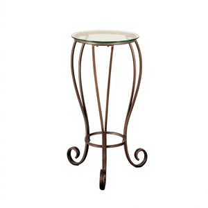 Table basse moderne et créative en fer forgé avec plateau en verre et tabouret en laiton modèle Amson AG-22761 pour chambre et salon - Product Image 1