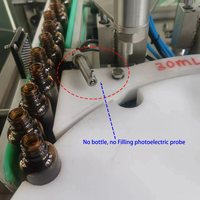 Ligne de production automatique de remplissage de flacons d'huiles essentielles et de parfums, machine de remplissage à double tête, ligne de production de bouchage et d'étiquetage