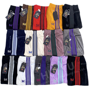 <span class=keywords><strong>Pantaloni</strong></span> Casual <span class=keywords><strong>da</strong></span> <span class=keywords><strong>uomo</strong></span> di alta qualità stile Streetwear con tasche a farfalla ricamate e <span class=keywords><strong>pantaloni</strong></span> sportivi stile Hip Hop a righe - Product Image 4