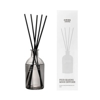 Diffuseur de parfum personnalisé en verre transparent rond avec bâtonnets en rotin noir, sans flamme, pour projets hôteliers