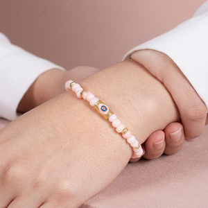 Bracelet extensible en opale rose avec breloque œil porte-bonheur et émail rose et bleu, en argent, de la marque Silver Export House - Product Image 3