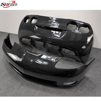 C6 modifié avec des pare-chocs avant et arrière en fibre de carbone Z06, adapté aux Corvette C6 de 2005 à 2013. Fournisseur en gros.